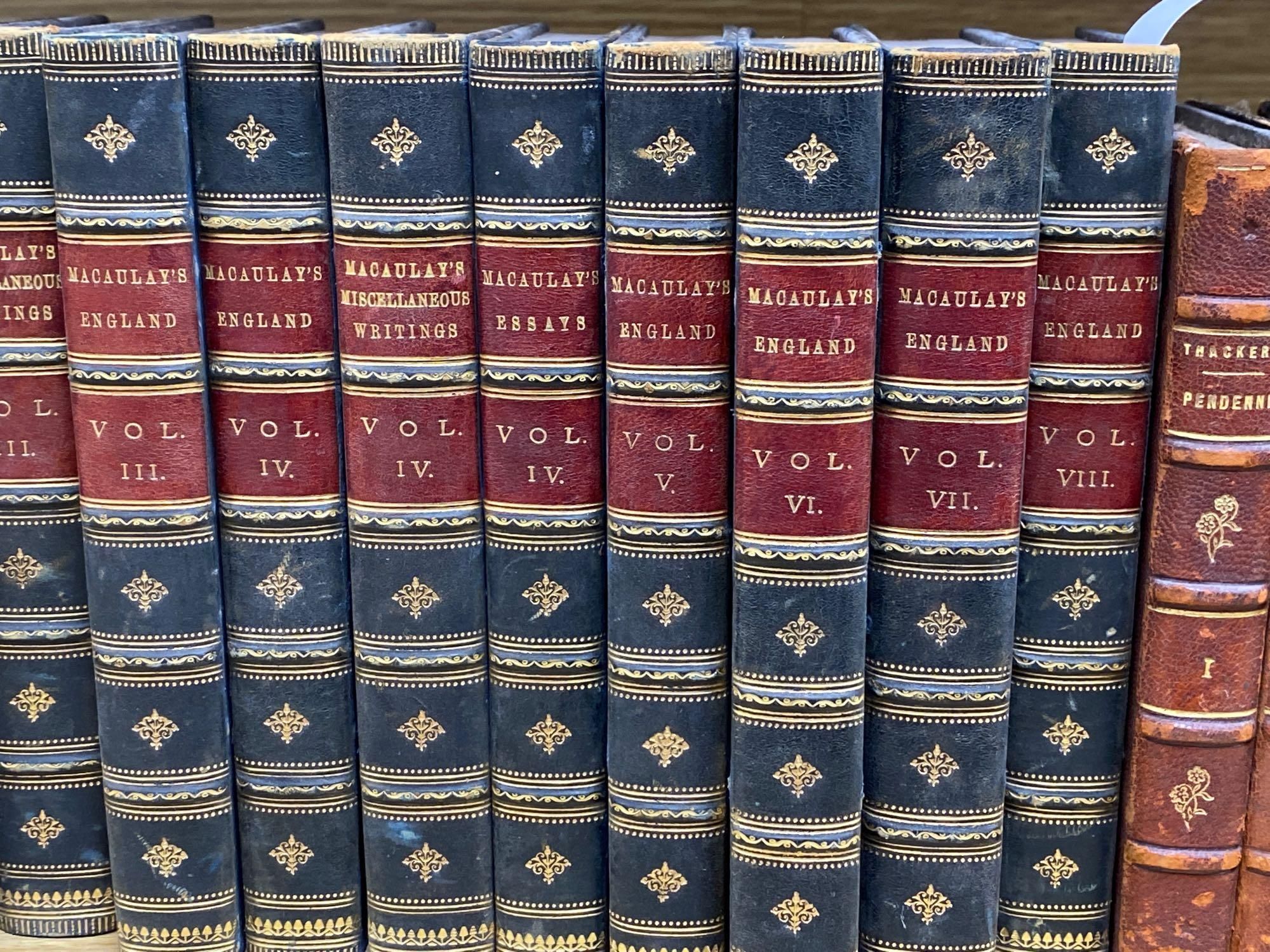 A collection of small bindings, including Macaulays England, Essays, etc., Thackeray, Froude and Ruskin